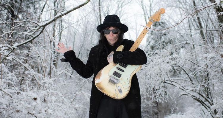 A picture of Stormy Deal's father and Motley Crue Guitarist, Mick Mars. 